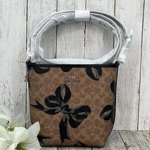 Coach City Bucket Bag Crossbody In Signature Canvas With Bow Print Purse
